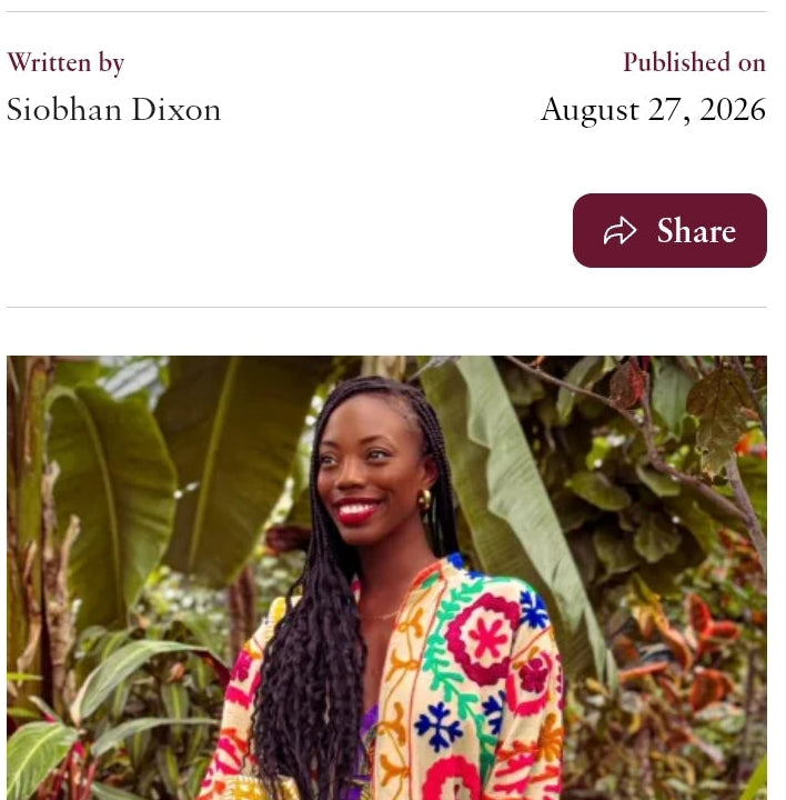  Madamenoire blog post titled 'The Diaspora Is Dripping! 22 Caribbean Bag Brands Bringing Culture & Craftsmanship To Your Closet', featuring a woman in a colorful patterned dress against a lush green background. Featuring Designs by Fiona Kimberly handmade bags 
