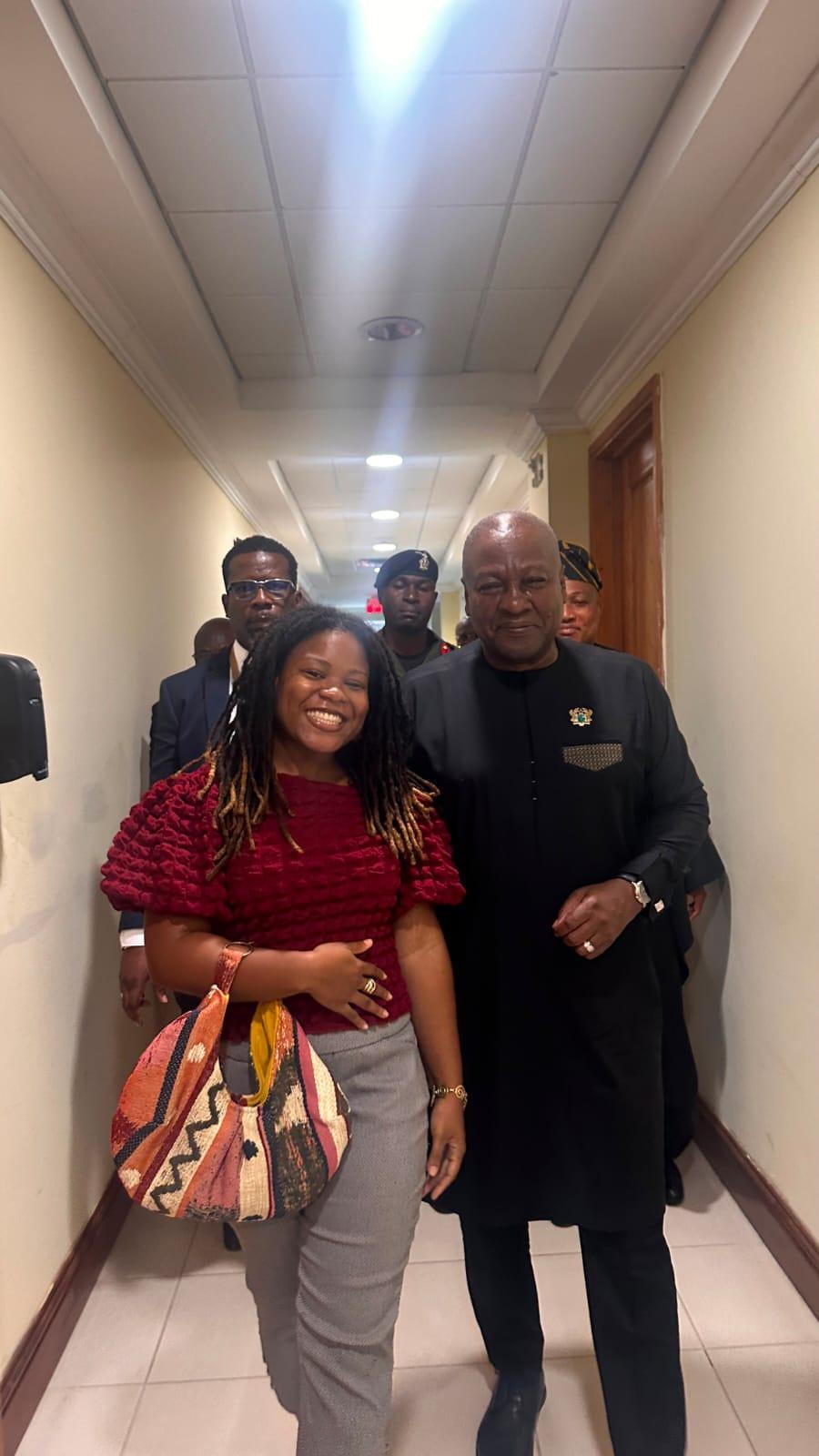 Yinga Violinist Jamaica wearing our Menori Tribal Statement bag  with the president of Ghana.  Sop Designs by Fiona Kimberly Jamaica best handcrafted handbags. Ship to Canada UK  USA Caribbean 